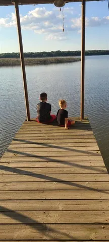 a view of a lake from a balcony