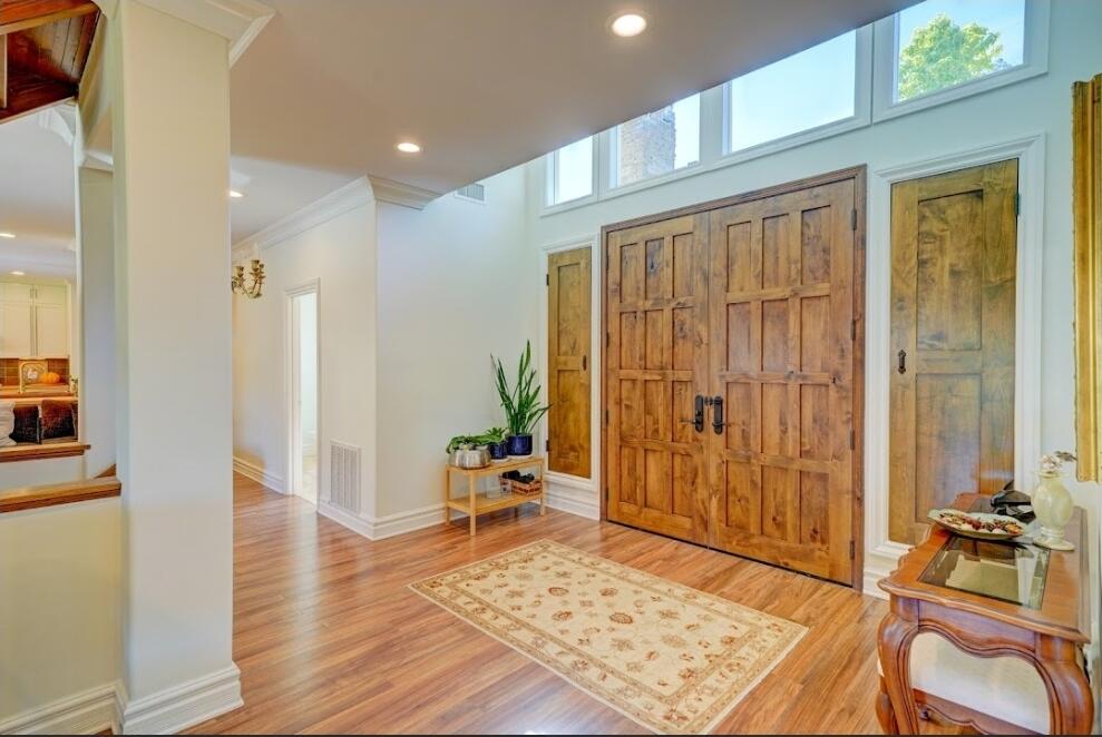 1377 Knoll Road Redlands, CA 92373 - Photo 21 of 28 a view of an entryway with wooden floor and a livingroom view