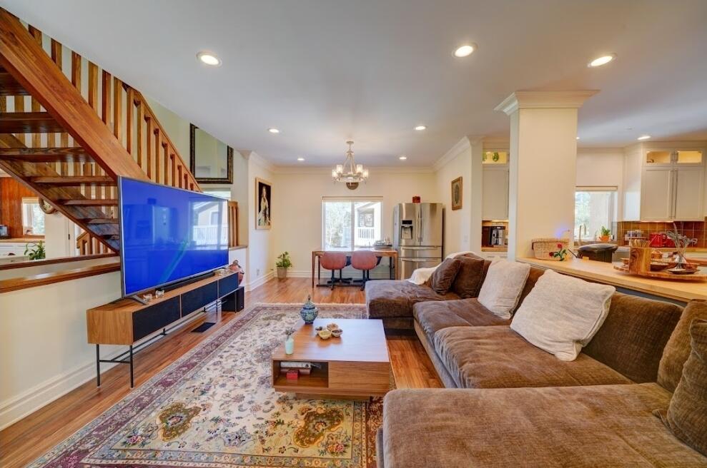 1377 Knoll Road Redlands, CA 92373 - Photo 25 of 28 a living room with furniture wooden floor and a table