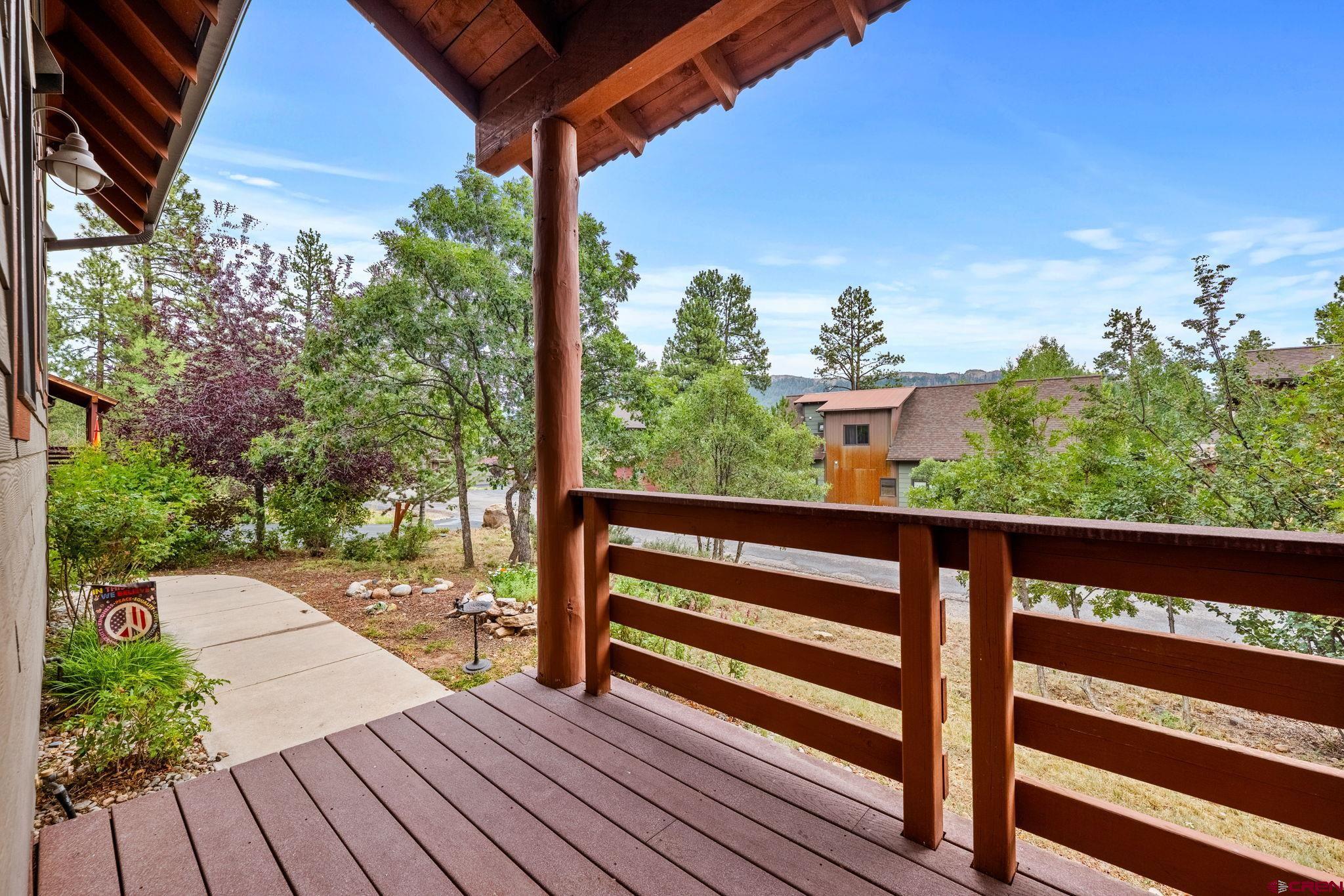 141 Red Canyon Trail, Unit E Durango, CO 81301 - Photo 31 of 42 a view of a balcony with wooden floor
