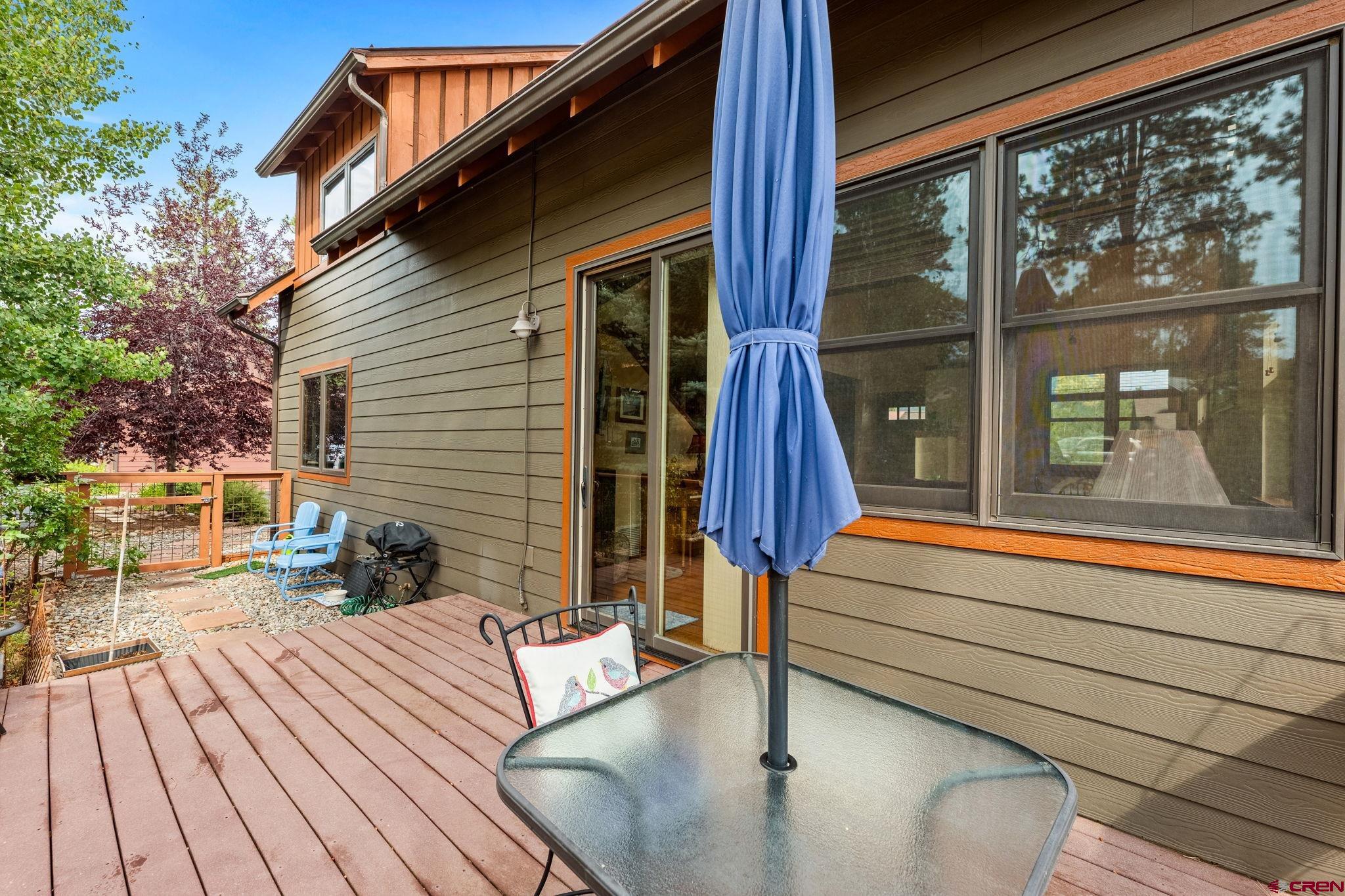 141 Red Canyon Trail, Unit E Durango, CO 81301 - Photo 34 of 42 a house view with a sitting space and garden