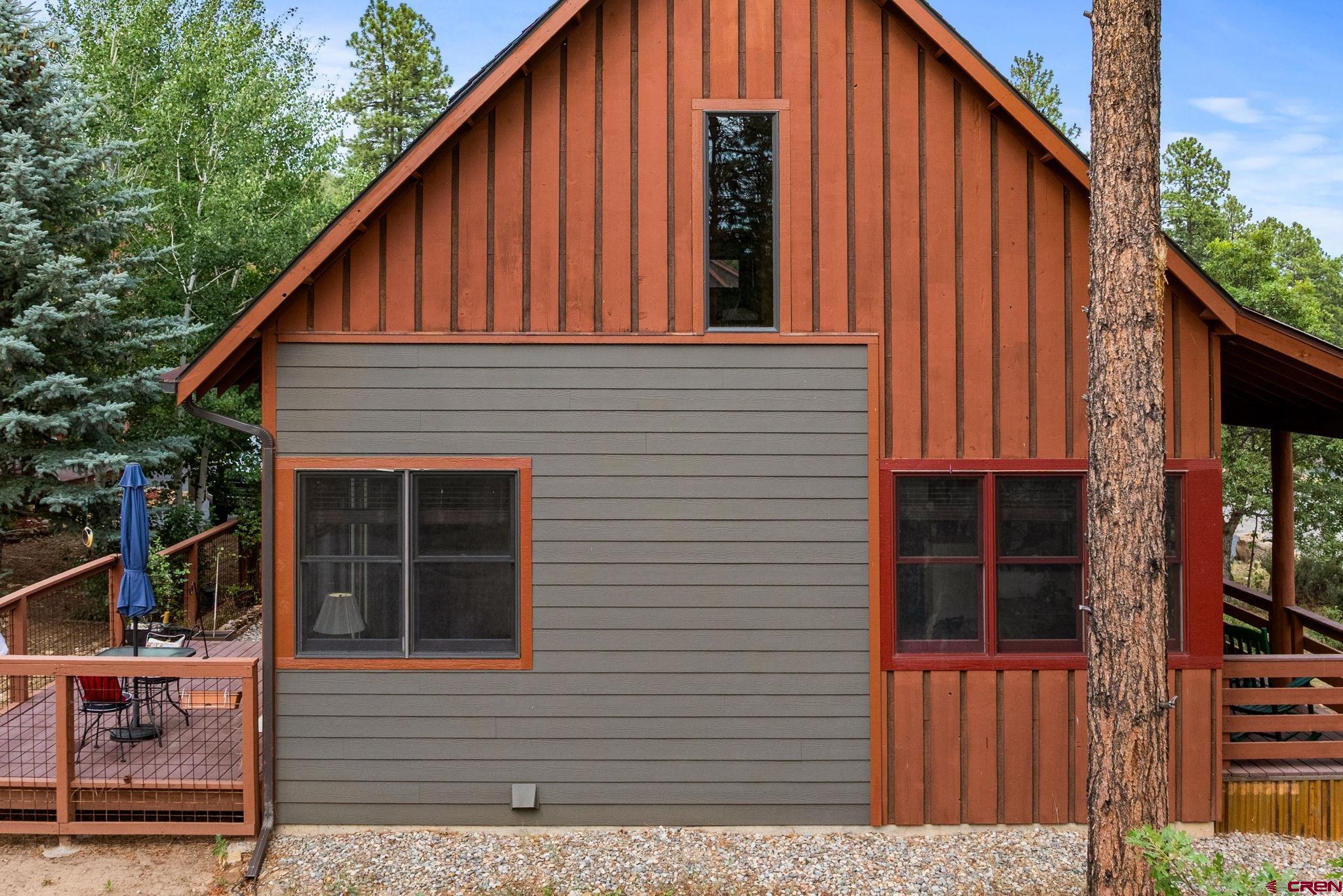 141 Red Canyon Trail, Unit E Durango, CO 81301 - Photo 36 of 42 a view of a house with backyard and deck
