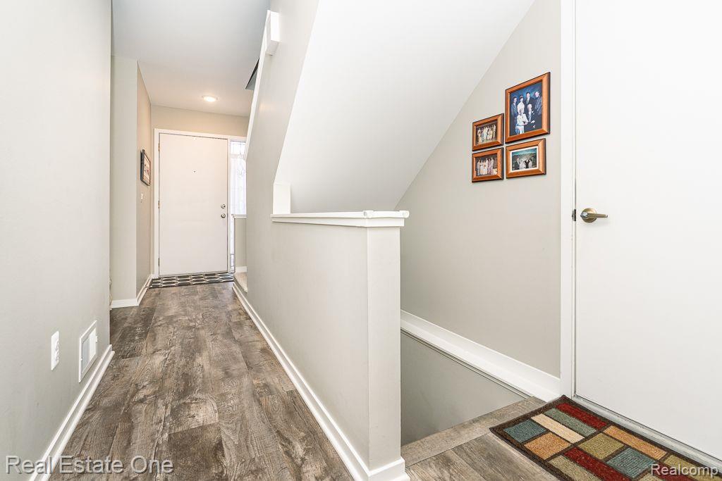 641 Ashley Circle East Rochester, MI 48307 - Photo 18 of 22 Garage entry with view to basement stairs