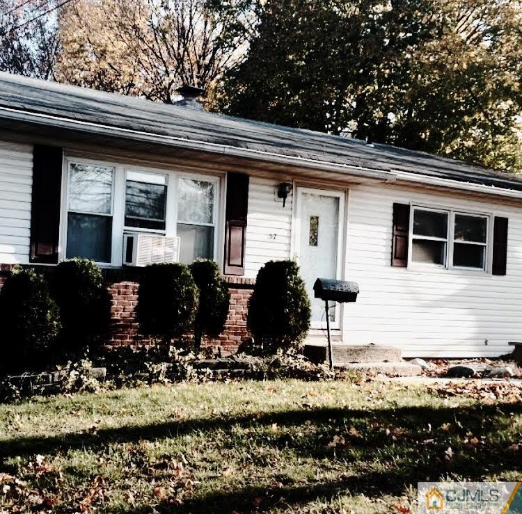 37 Tunison Road New Brunswick, NJ 08901 - Photo 1 of 1 a front view of house with yard