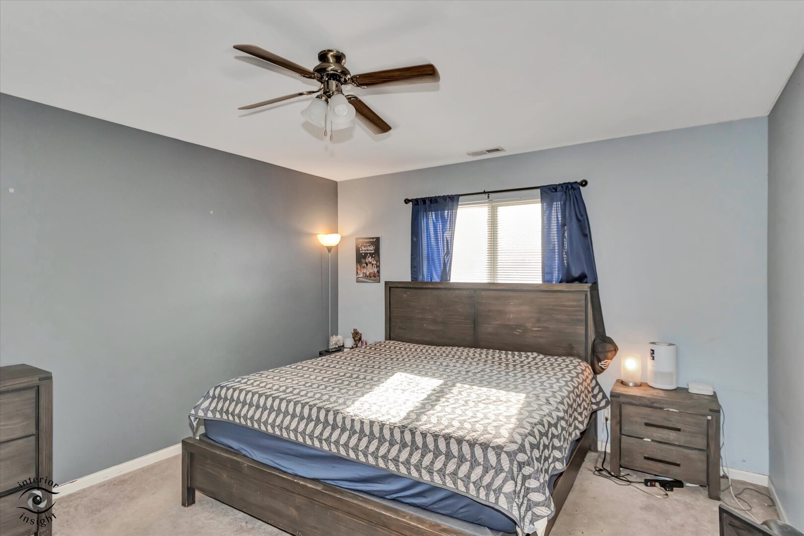 1831 South Wentworth Circle Romeoville, IL 60446 - Photo 14 of 23 a bedroom with a large bed and a chandelier