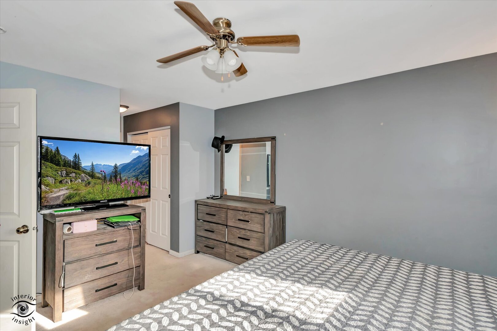 1831 South Wentworth Circle Romeoville, IL 60446 - Photo 15 of 23 a bedroom with a bed and a flat screen tv