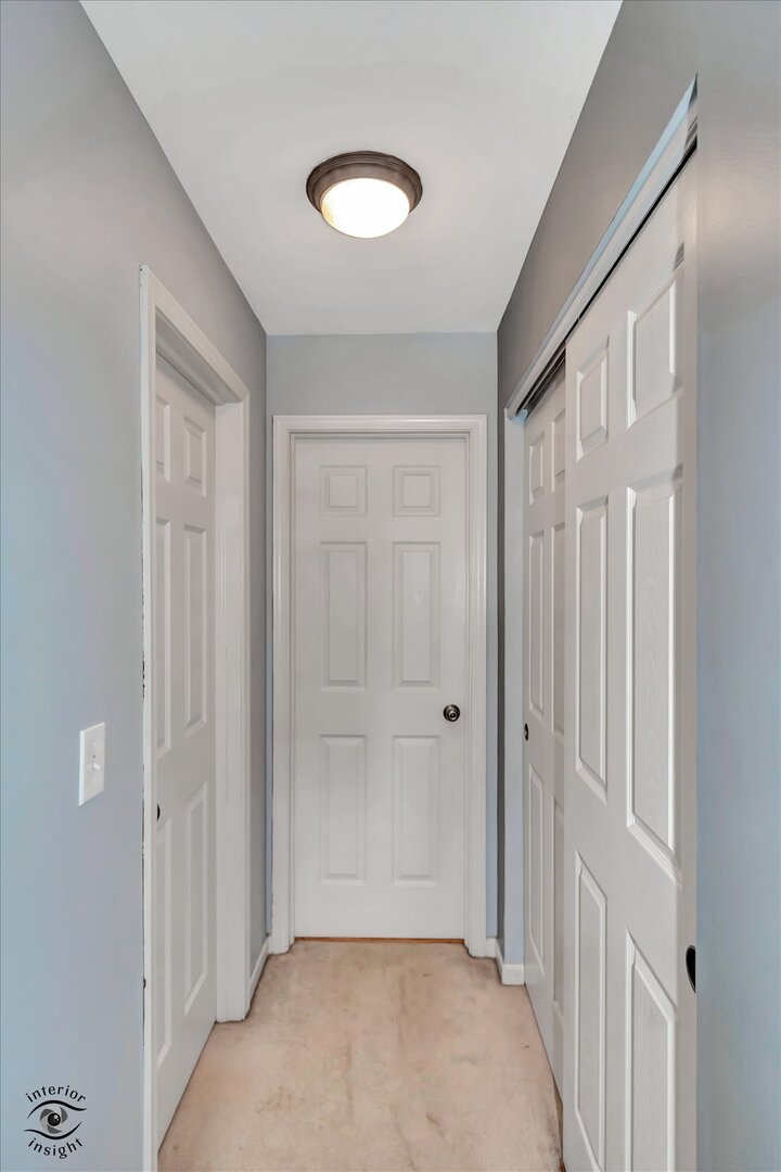 1831 South Wentworth Circle Romeoville, IL 60446 - Photo 17 of 23 a view of a livingroom with wooden floor and a bathroom