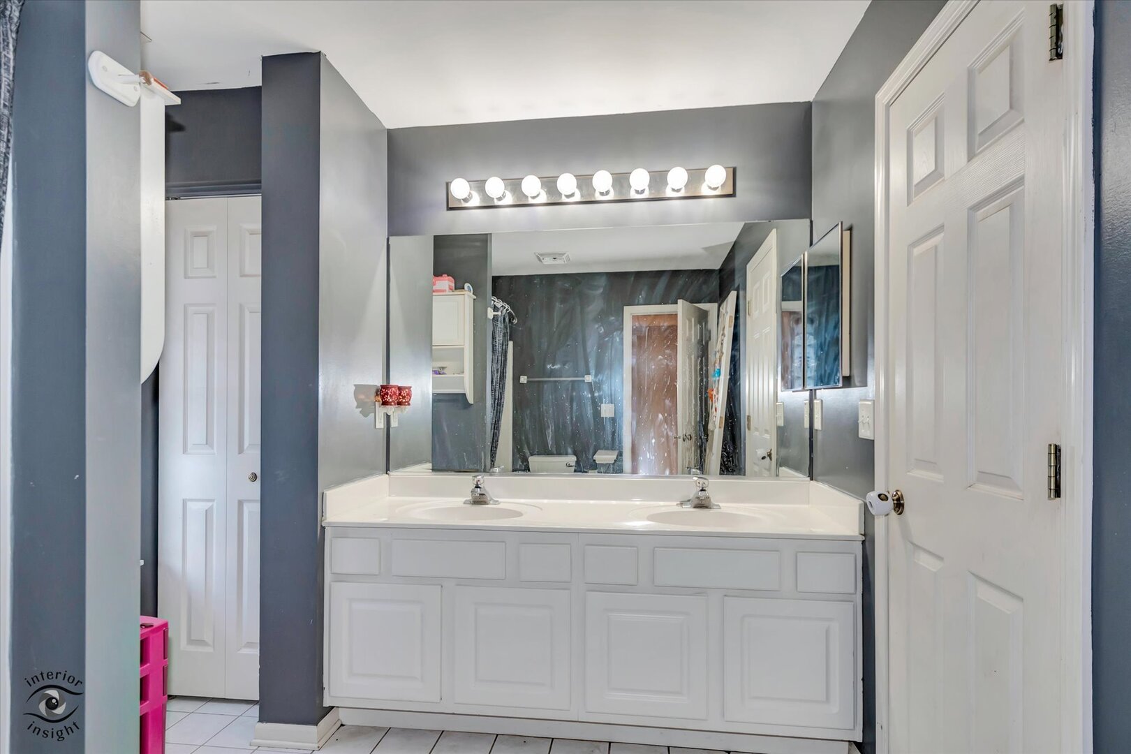 1831 South Wentworth Circle Romeoville, IL 60446 - Photo 18 of 23 a bathroom with a double vanity sink and a mirror