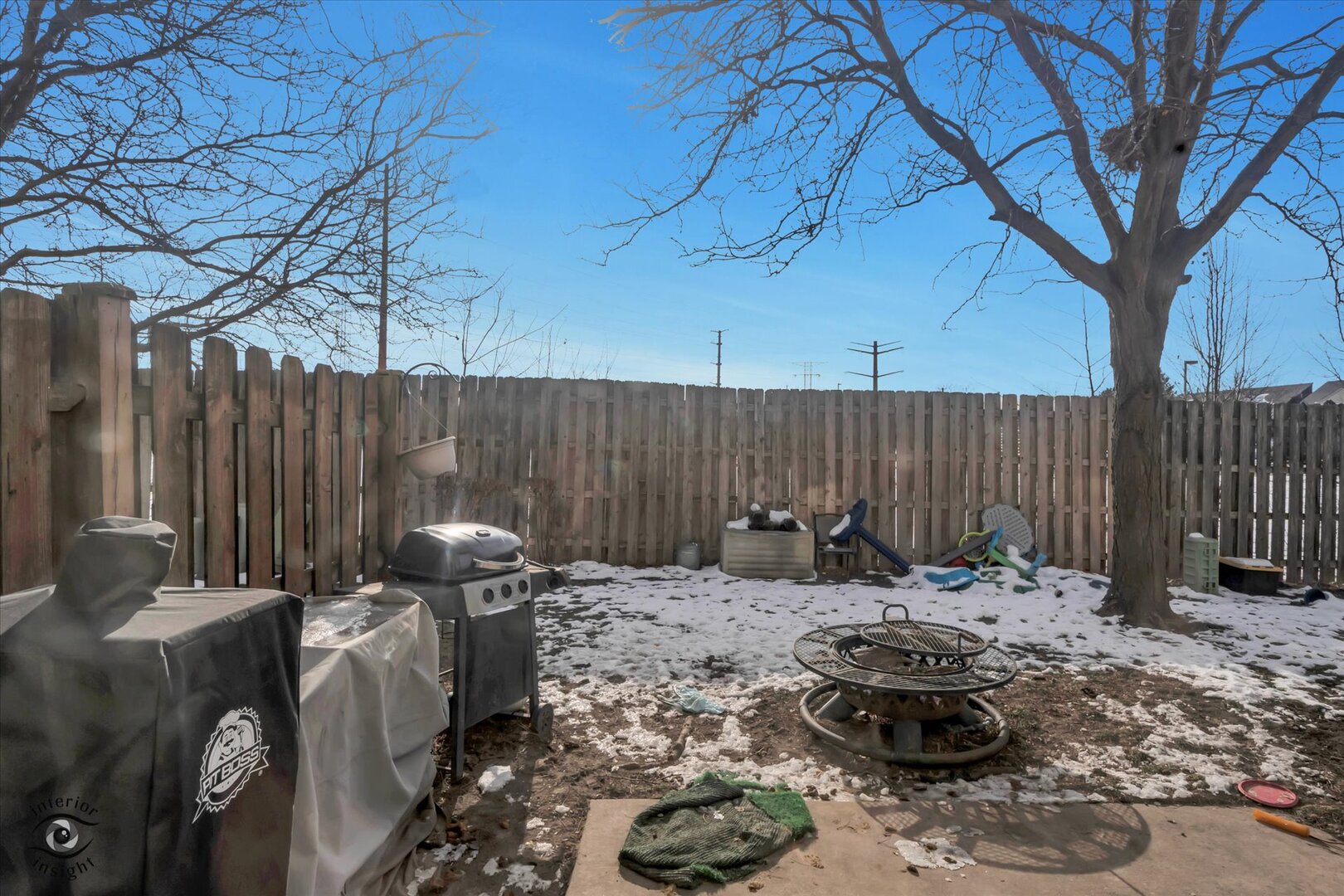 1831 South Wentworth Circle Romeoville, IL 60446 - Photo 22 of 23 a backyard of a house with table and chairs