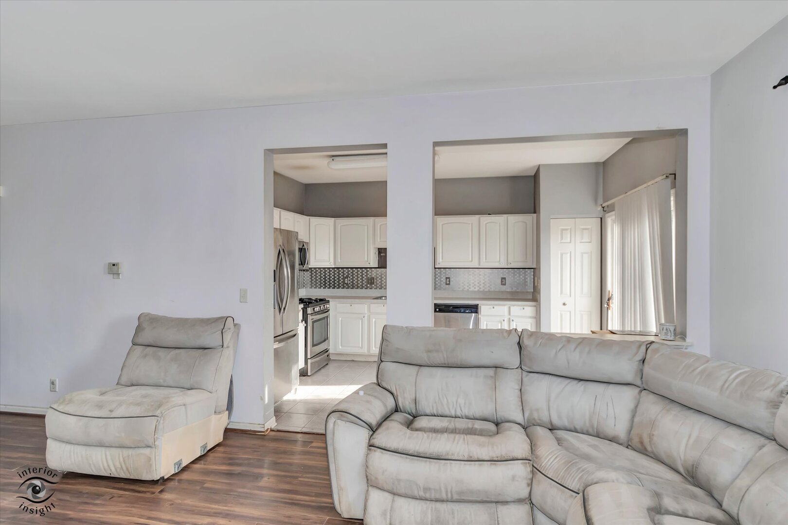 1831 South Wentworth Circle Romeoville, IL 60446 - Photo 7 of 23 a living room with furniture and a wooden floor