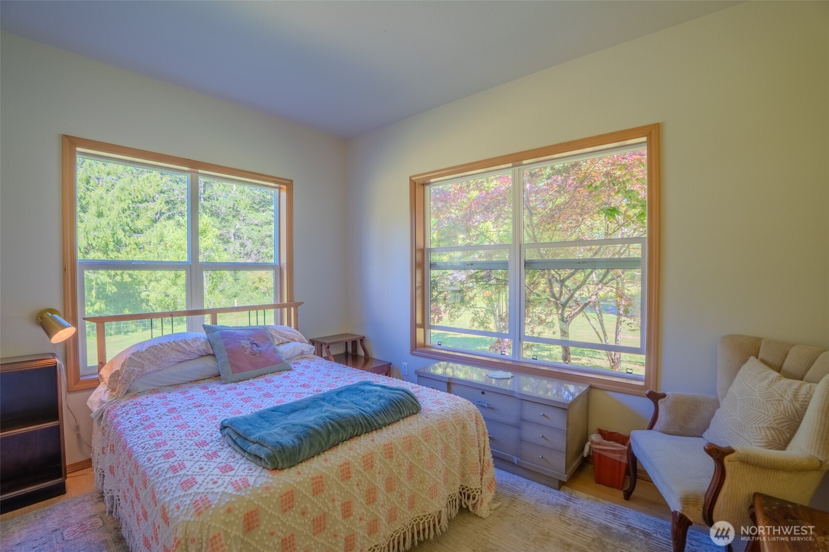 5178 Orcas Road Orcas Island, WA 98245 - Photo 10 of 37 a bedroom with a bed and a chair