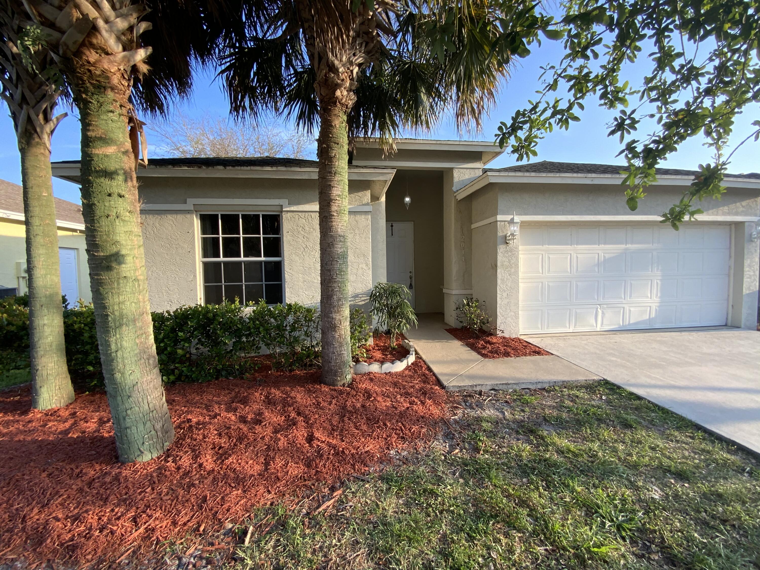 2033 Prairie Key Road Palm Springs, FL 33406 - Photo 1 of 19 Front