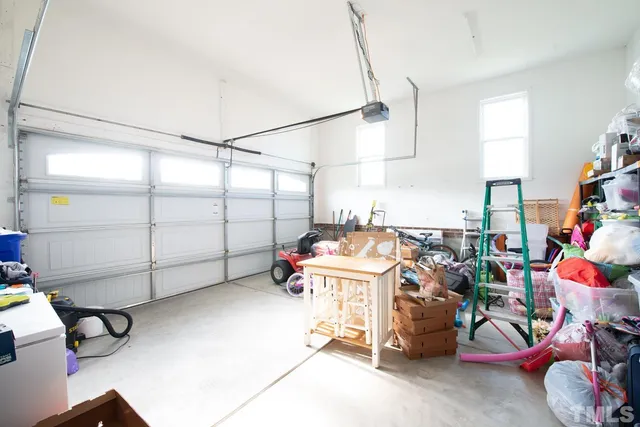 a view of a garage with washing machine