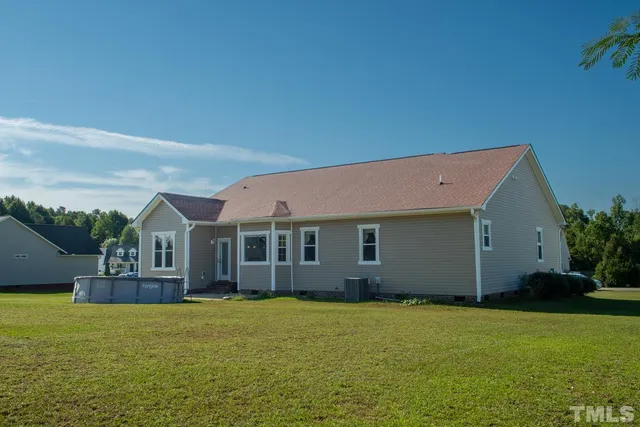 a view of a house with a garden