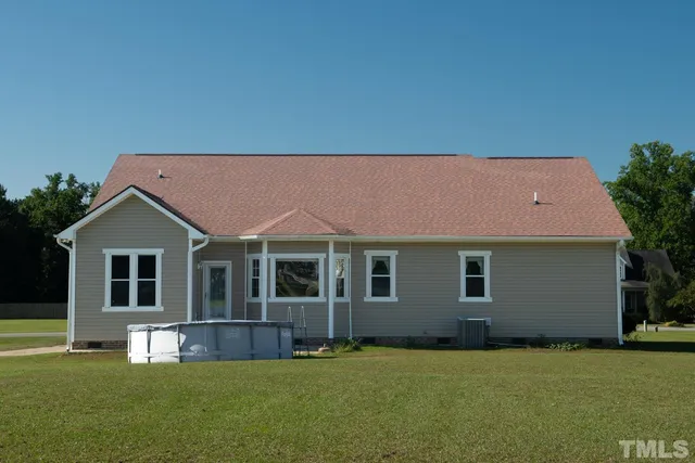a house with a garden in front of it