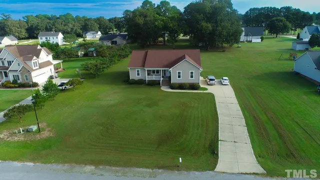 view of a house with a yard