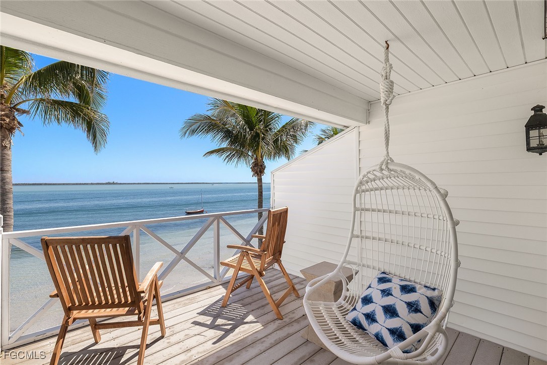 114 Useppa Island, Unit A Bokeelia, FL 33922 - Photo 32 of 44 a view of outdoor space with seating area
