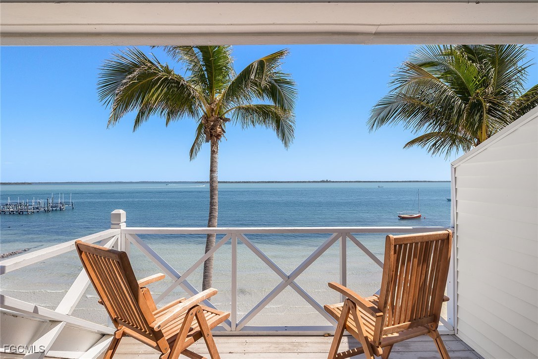 114 Useppa Island, Unit A Bokeelia, FL 33922 - Photo 33 of 44 a view of outdoor space with seating area