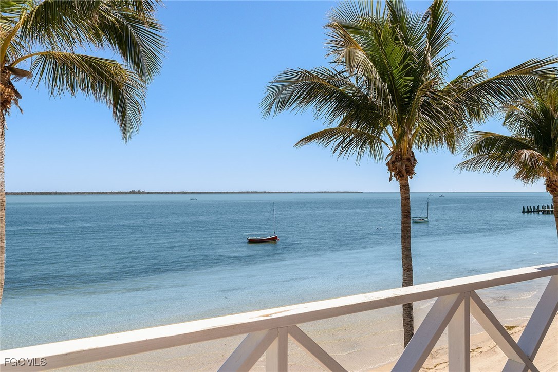 114 Useppa Island, Unit A Bokeelia, FL 33922 - Photo 35 of 44 a view of outdoor space with palm trees