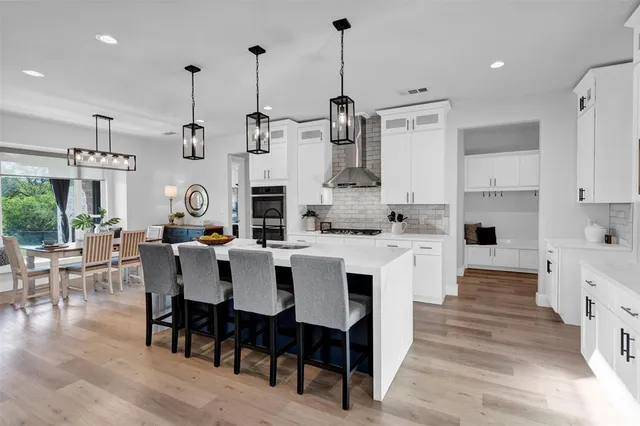 a large kitchen with lots of counter space and appliances