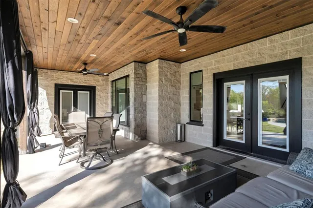 a living room with furniture and a table