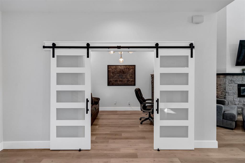 175 Bittersweet Trail Weatherford, TX 76088 - Photo 8 of 40 a view of a hallway with wooden floor and closet