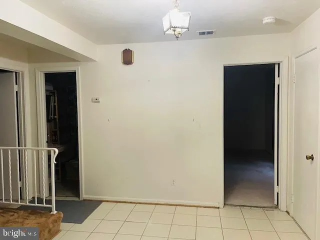 a kitchen with stainless steel appliances a stove a sink and a refrigerator