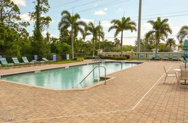 swimming pool with outdoor seating