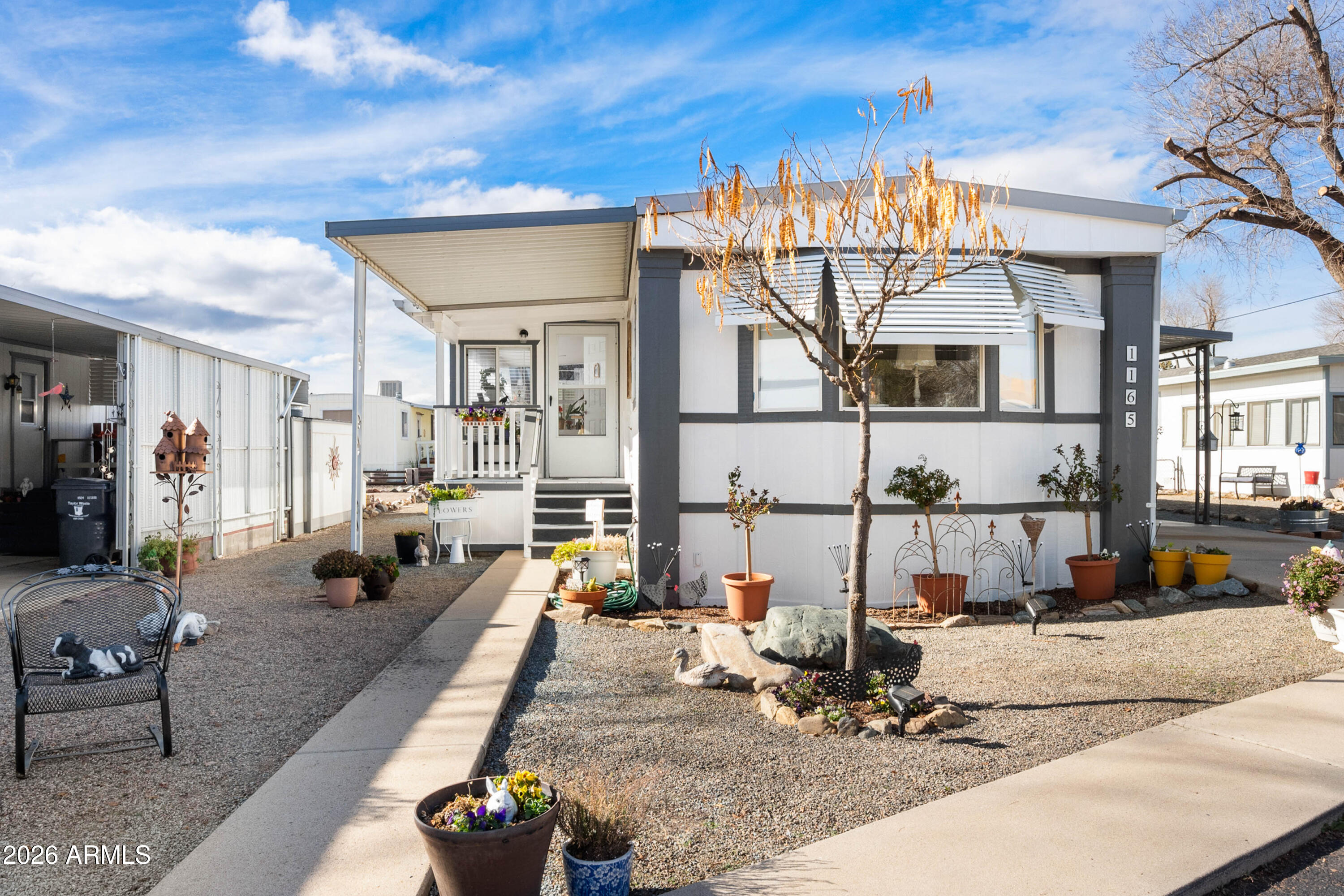 a view of a living room and chandelier
