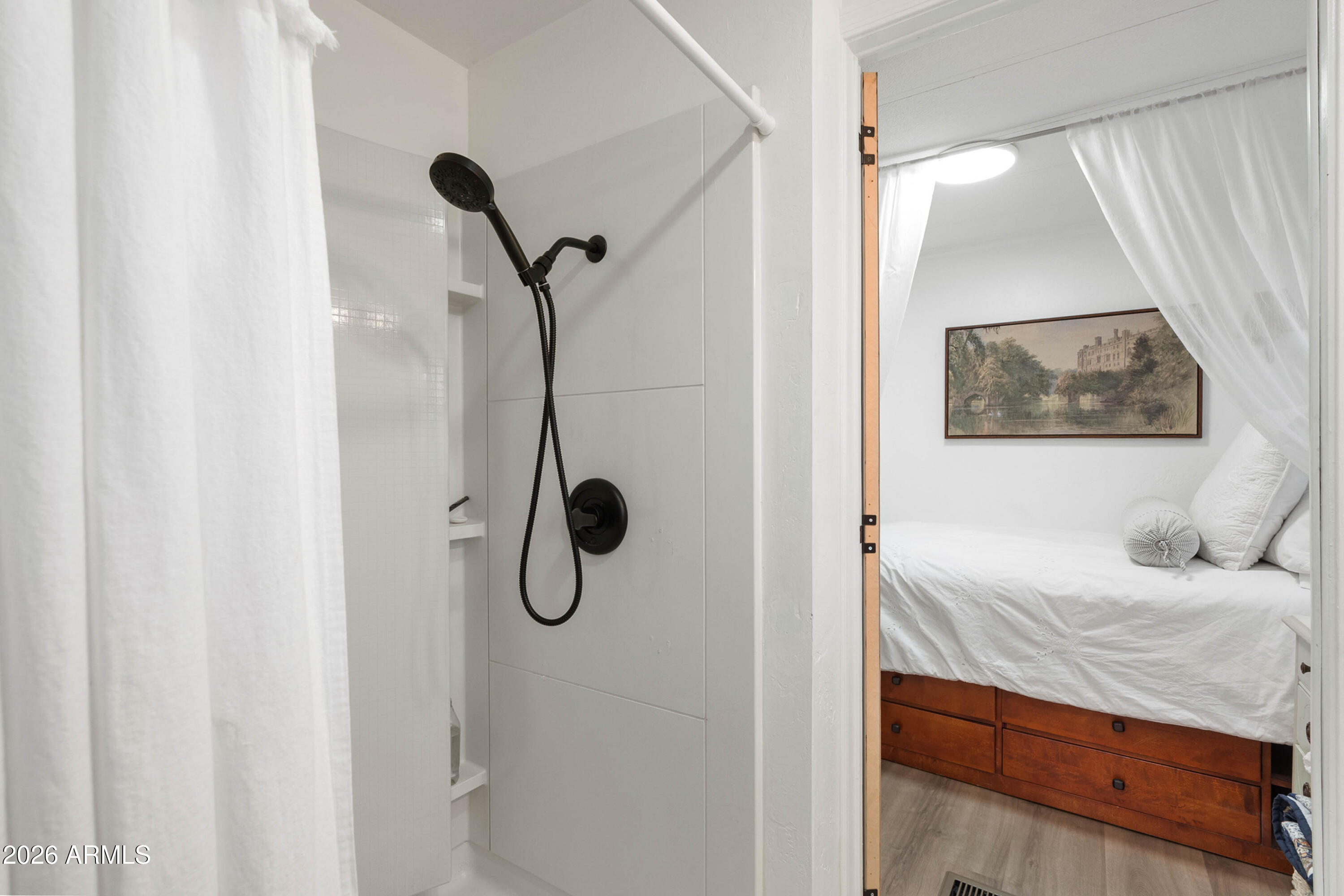1165 Rocking M Lane, Unit 1165 Prescott Valley, AZ 86327 - Photo 15 of 30 a bathroom with a sink and mirror