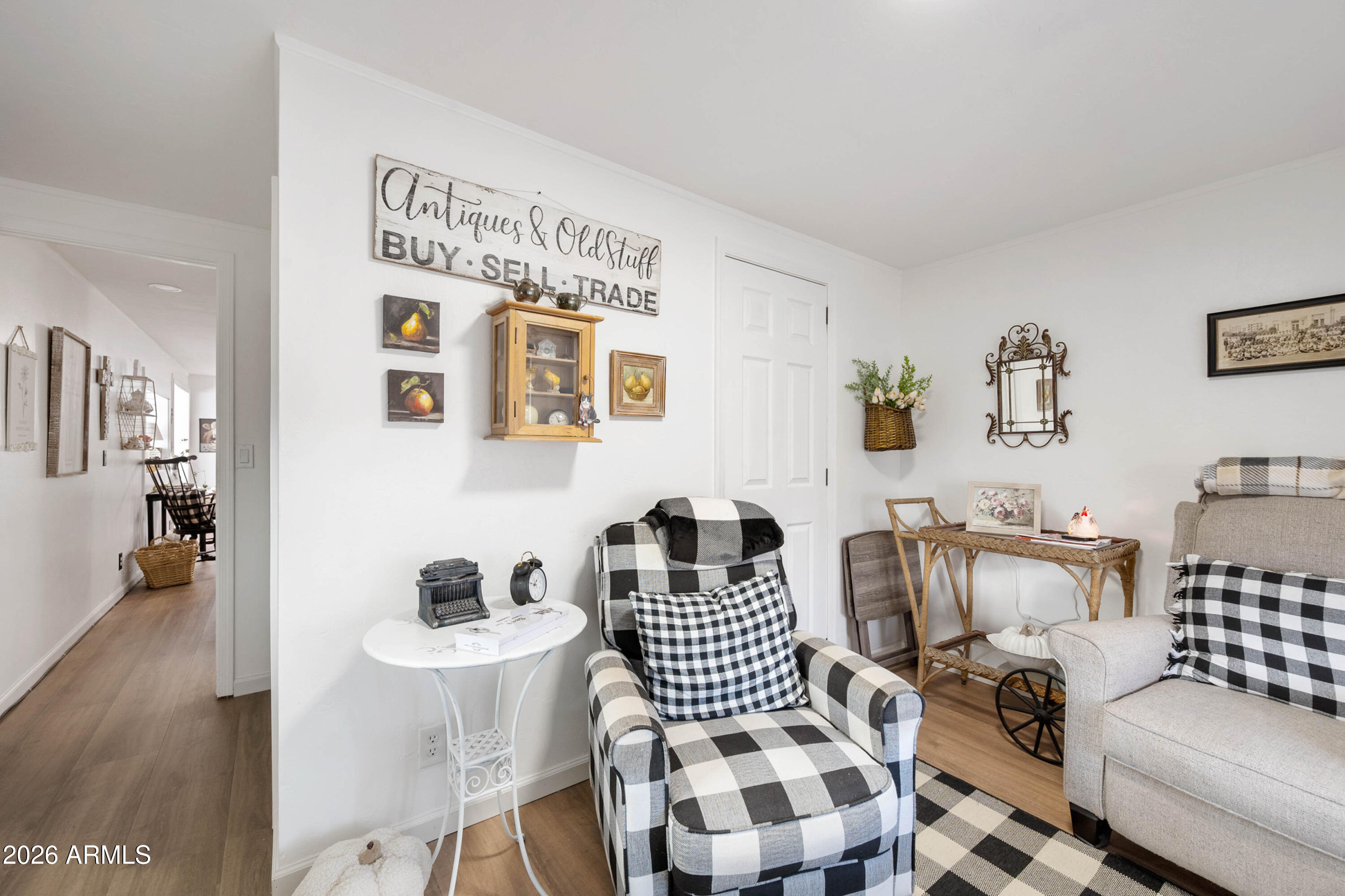 1165 Rocking M Lane, Unit 1165 Prescott Valley, AZ 86327 - Photo 18 of 30 a living room with furniture and wooden floor