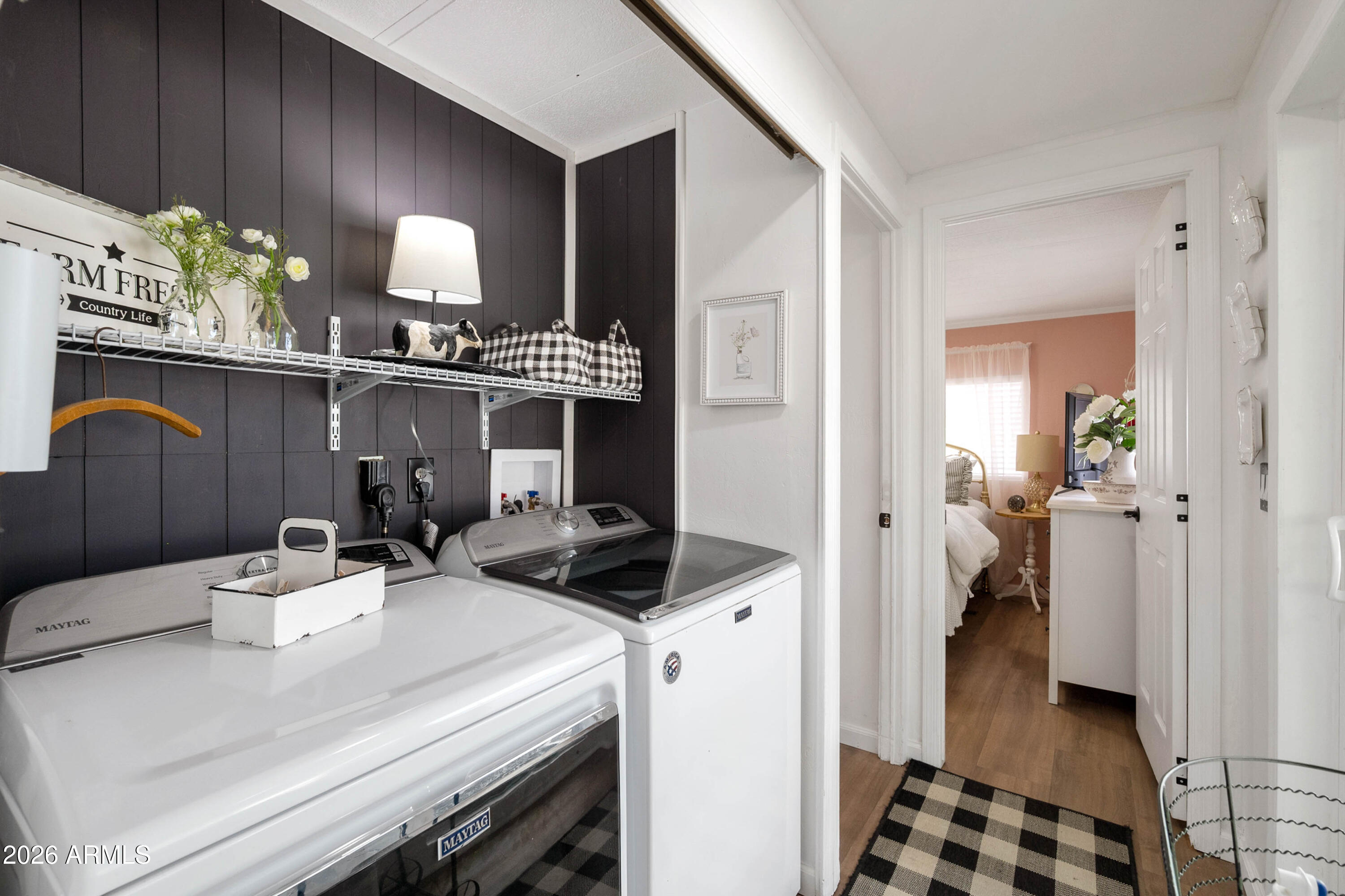 1165 Rocking M Lane, Unit 1165 Prescott Valley, AZ 86327 - Photo 24 of 30 a kitchen with a sink a stove and cabinets
