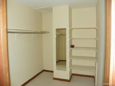 621 South Crooks Road, Unit 11 Clawson, MI 48017 - Photo 12 of 14 walk in closet.jpg