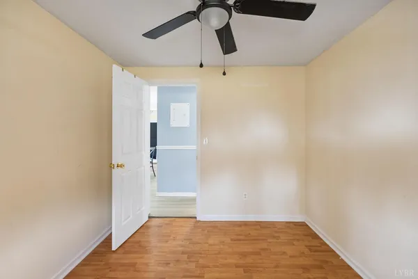 a house with trees in the background