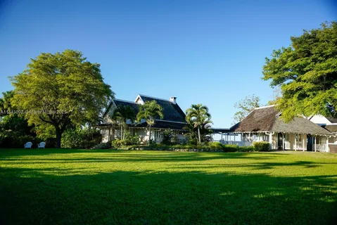 a front view of building with yard