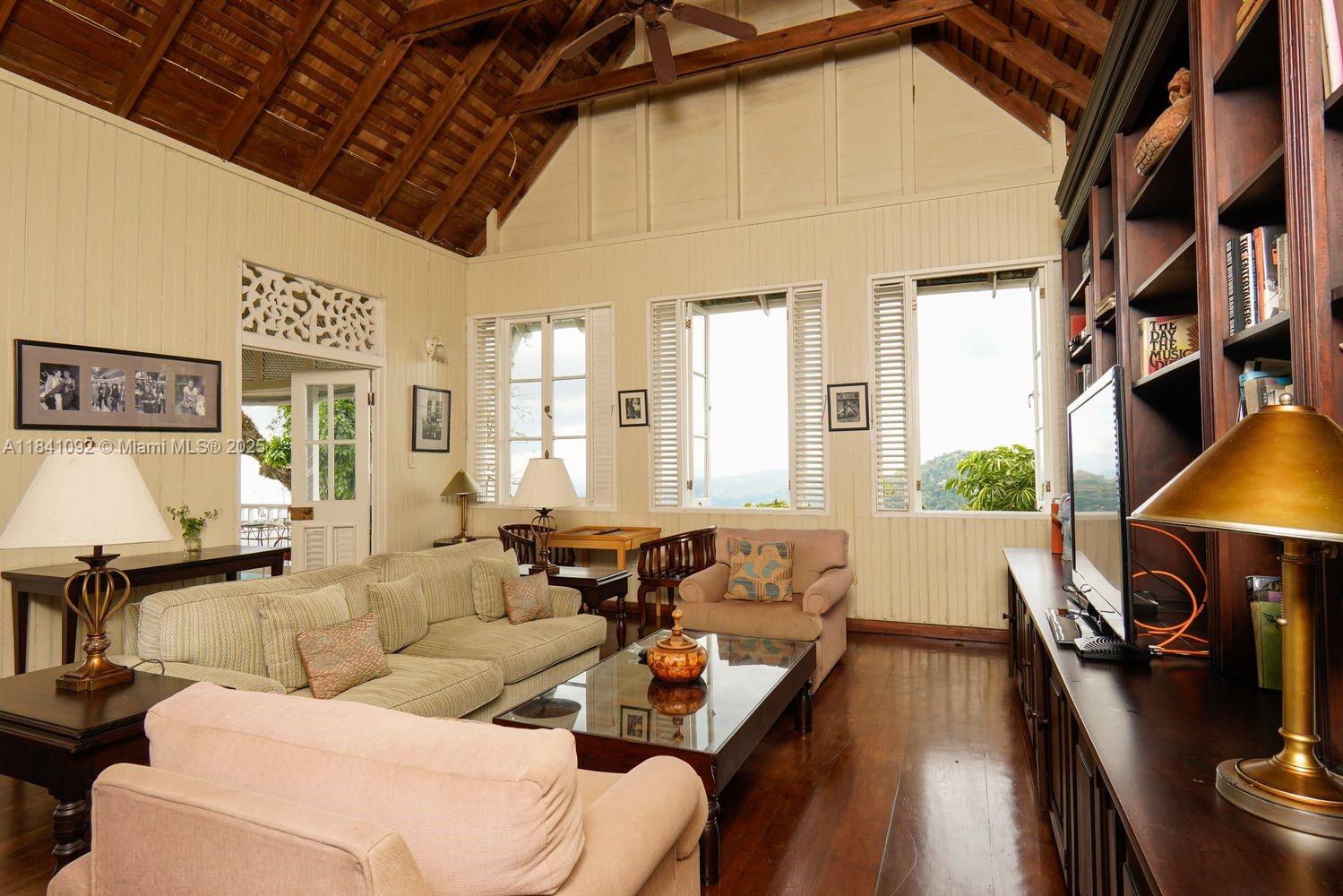 B1 New Castle Road undefined, - 00000 - Photo 20 of 38 a living room with furniture and a flat screen tv