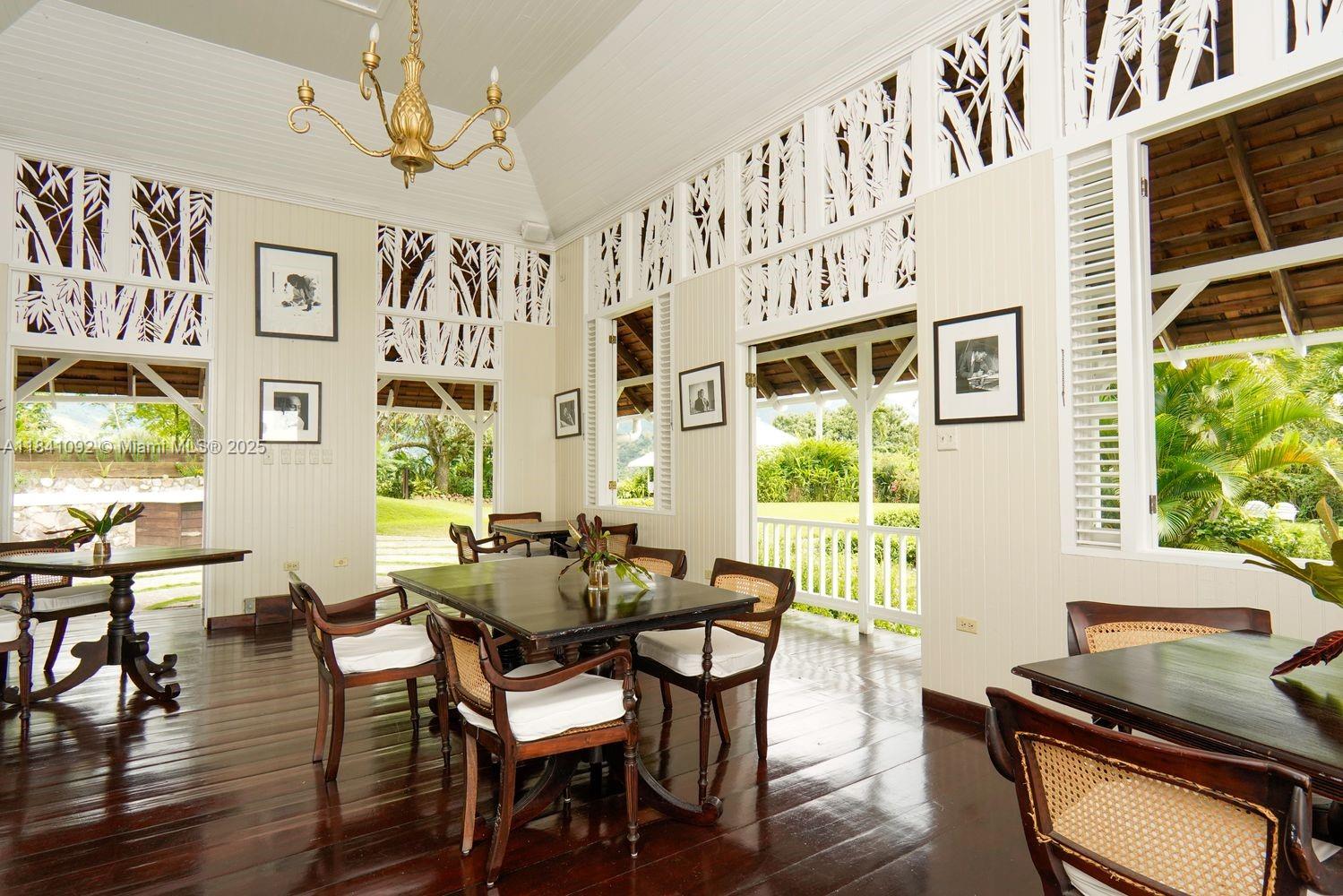 B1 New Castle Road undefined, - 00000 - Photo 21 of 38 a view of a dining room with furniture window and wooden floor