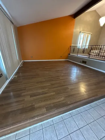 a bathroom with a double vanity sink mirror and toilet