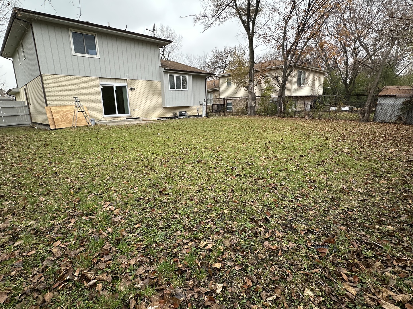 16627 Carse Avenue Harvey, IL 60426 - Photo 23 of 23 a view of a house with a yard