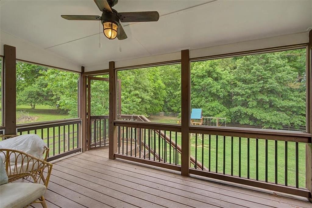 409 Windsor Way Canton, GA 30115 - Photo 35 of 51 a view of a balcony with wooden floor