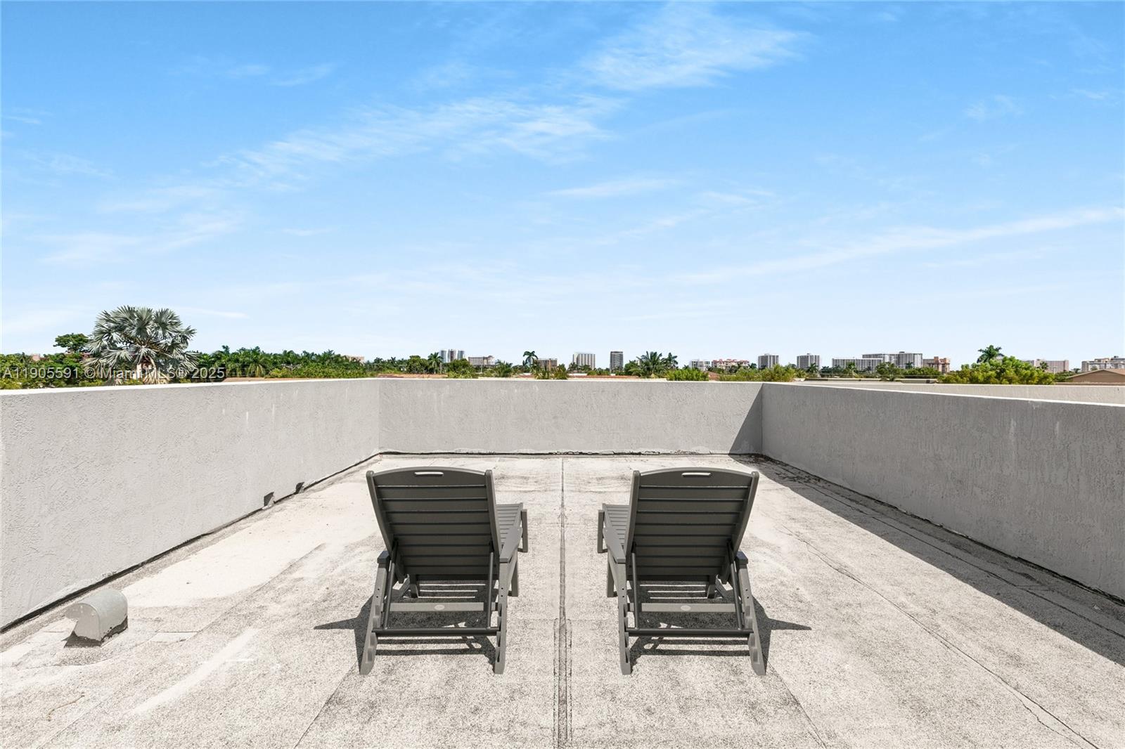 1123 Northeast 23rd Terrace Pompano Beach, FL 33062 - Photo 31 of 35 a view of a chairs and table in the terrace
