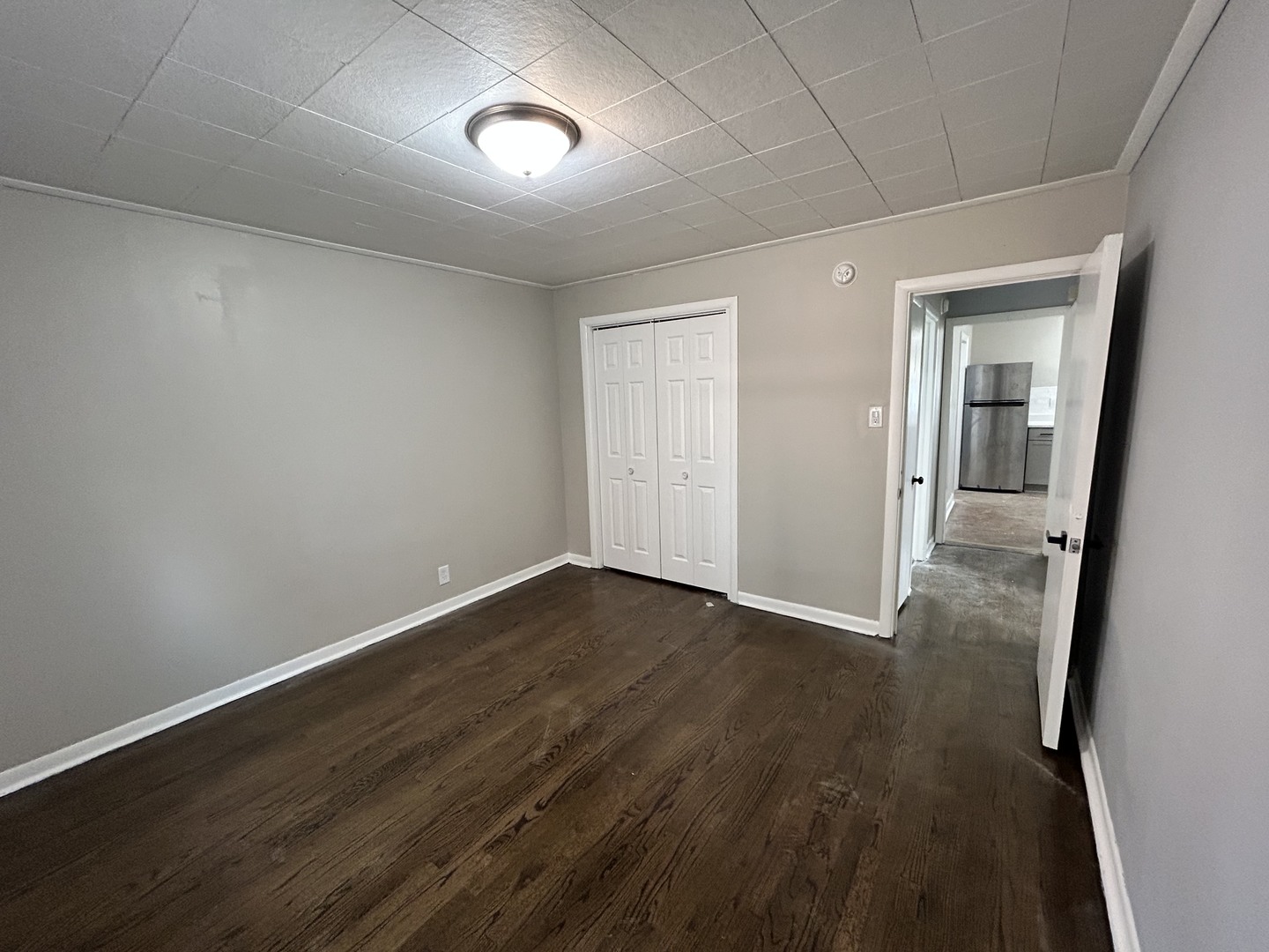 16155 Honore Avenue Markham, IL 60428 - Photo 3 of 5 wooden floor in an empty room