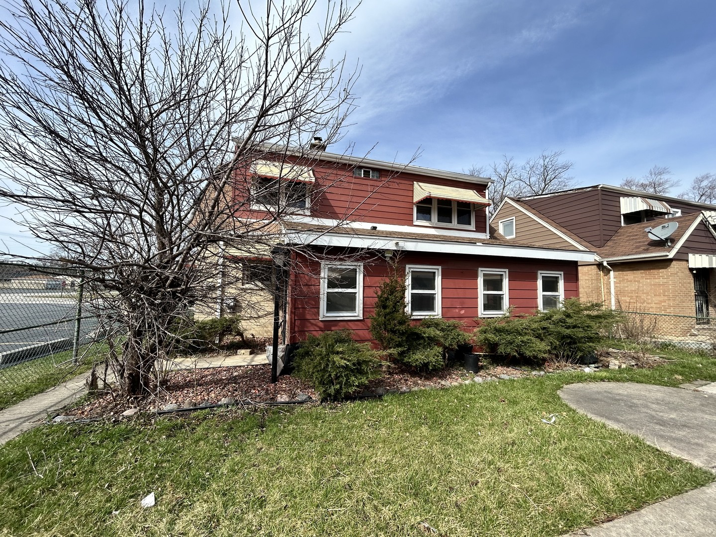 16155 Honore Avenue Markham, IL 60428 - Photo 5 of 5 a front view of a house with a yard