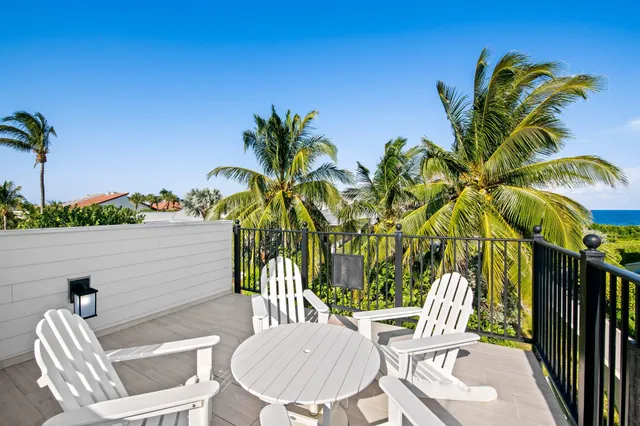 a view of house with outdoor seating