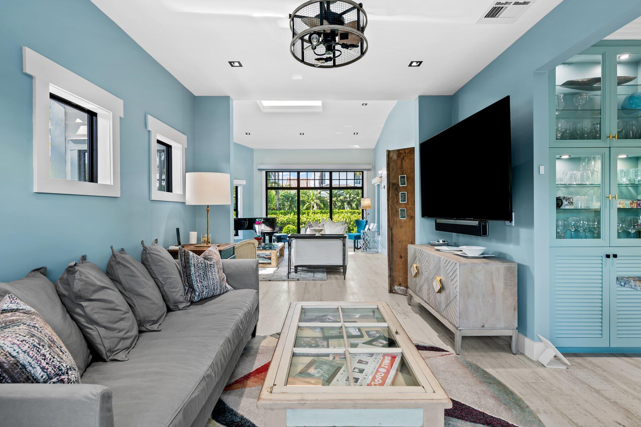 38 Hersey Drive Ocean Ridge, FL 33435 - Photo 9 of 33 a living room with furniture and a flat screen tv