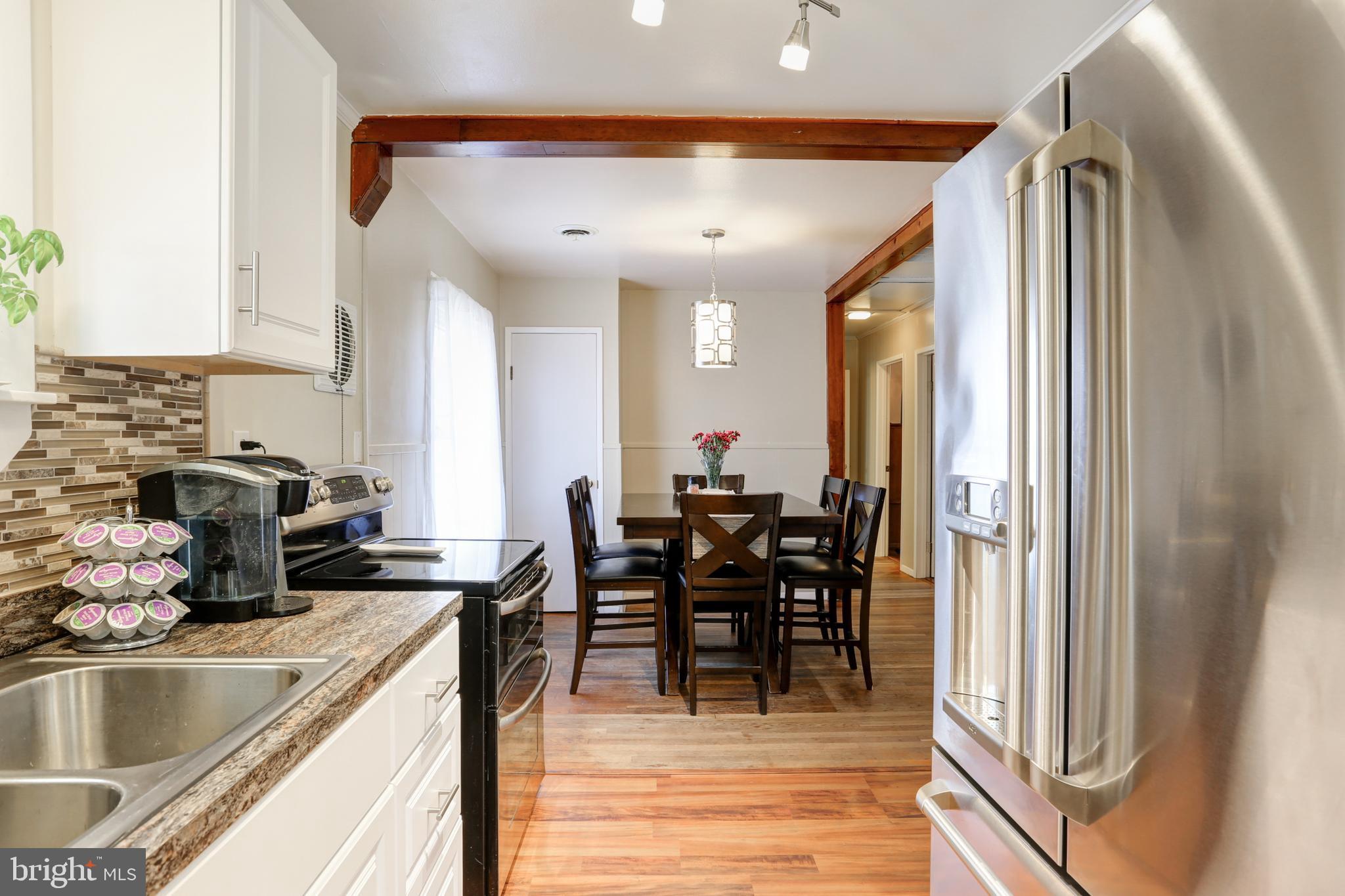 793 Heck Hill Road Lewisberry, PA 17339 - Photo 6 of 29 Kitchen leads to Dining area