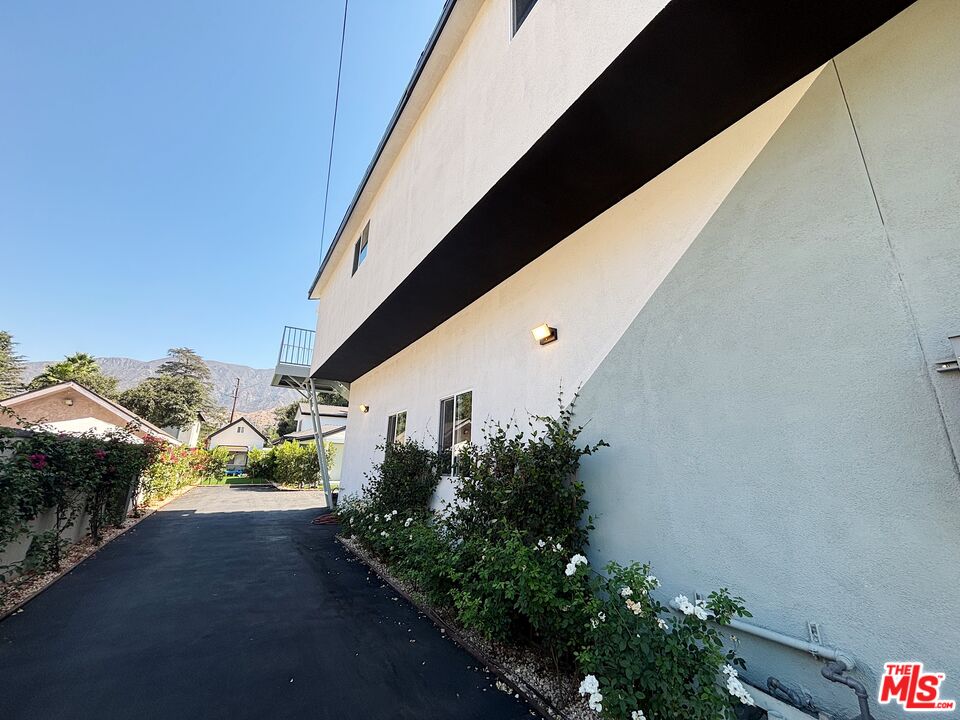 713 Devirian Place Altadena, CA 91001 - Photo 22 of 23 a view of a balcony with flower plants
