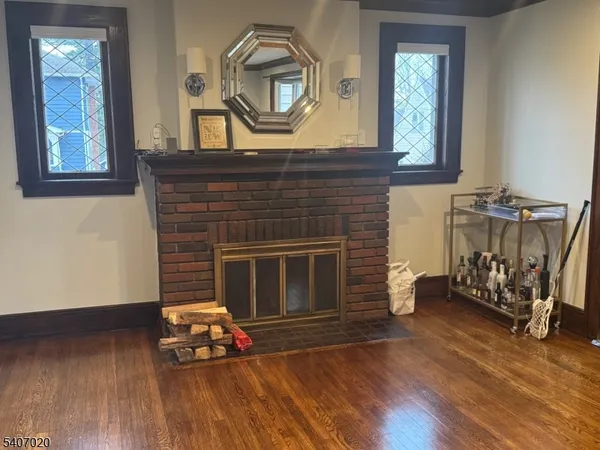 a large kitchen with kitchen island a sink stainless steel appliances and cabinets