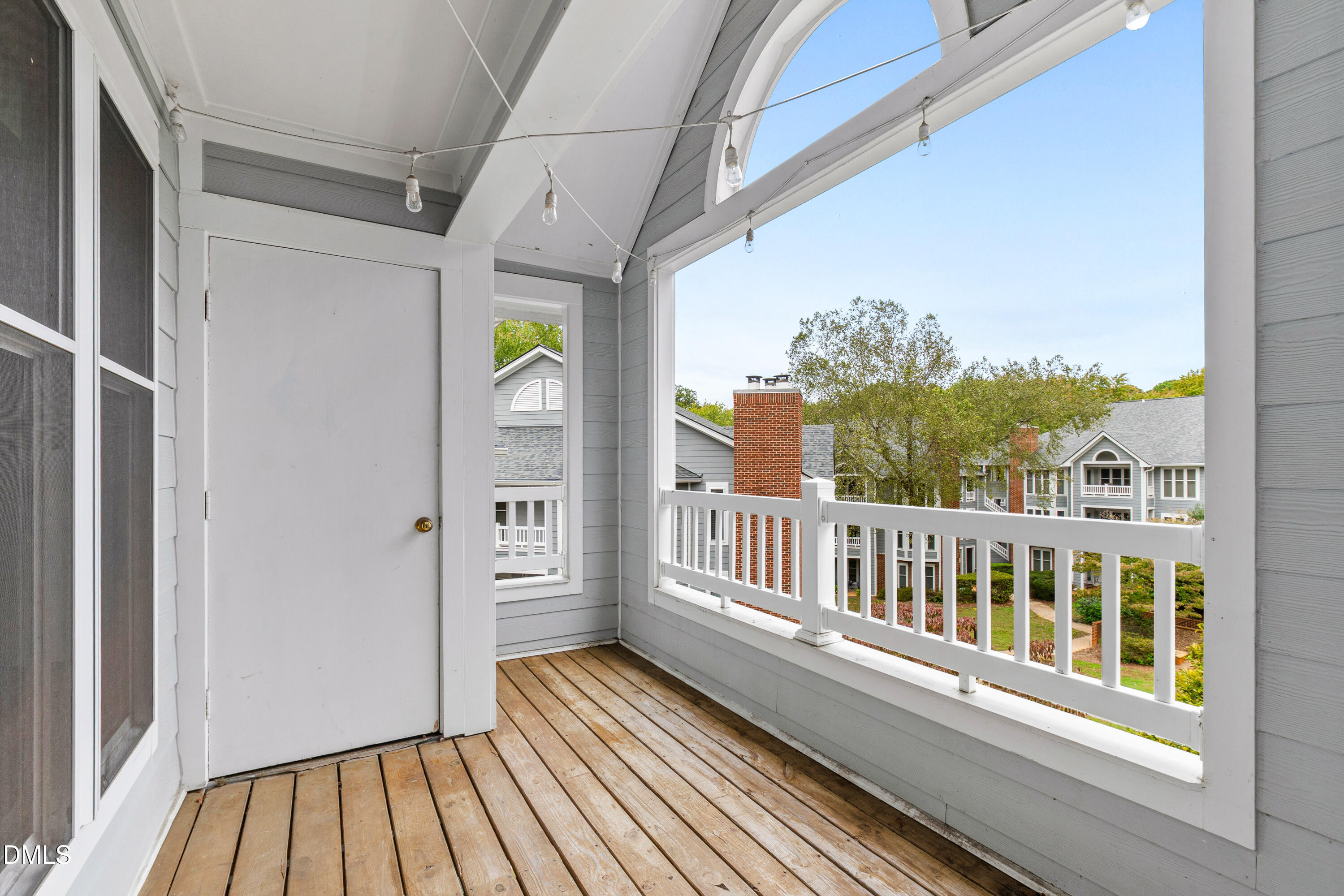 911 Washington Street, Unit 301 Raleigh, NC 27605 - Photo 14 of 22 a view of a balcony with wooden floor