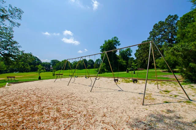 a view of a park with a slide